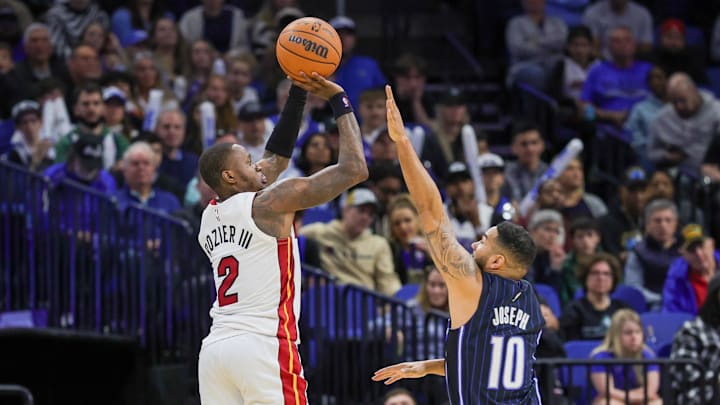 Miami Heat guard Terry Rozier (2) shoots against Orlando Magic guard Cory Joseph (10) during the second half at Kia Center.