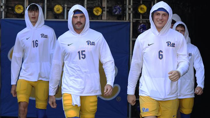 Sep 26, 2026; Pittsburgh, Pennsylvania, USA;  Pittsburgh Panthers quarterback Mason Heintschel (6) leads fellow quarterbacks Corey Dailey (16) and Holden Geriner (15) onto the field to warm up against the Bucknell Bison at Acrisure Stadium.  Mandatory Credit: Charles LeClaire-Imagn Images