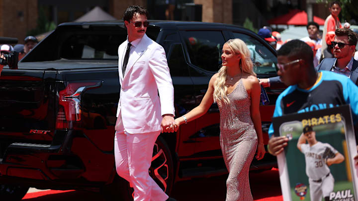 Jul 16, 2024; Arlington, Texas, USA; Pittsburgh Pirates pitcher Paul Skenes walks the red carpet with LSU gymnast and girlfriend Livvy Dunne before the 2024 MLB All-Star game at Globe Life Field. Mandatory Credit: Kevin Jairaj-Imagn Images Jul 16, 2024; Arlington, Texas, USA; Pittsburgh Pirates pitcher Paul Skenes walks the red carpet with LSU gymnast and girlfriend Livvy Dunne before the 2024 MLB All-Star game at Globe Life Field. Mandatory Credit: Kevin Jairaj-Imagn Images