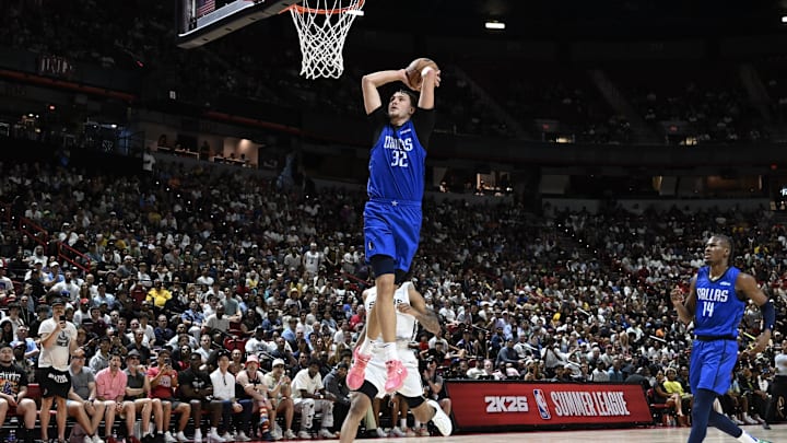 Jul 12, 2025; Las Vegas, NV, USA; Dallas Mavericks forward Cooper Flagg (32) dunks against the San Antonio Spurs in the fourth quarter of their game at Thomas & Mack Center. Mandatory Credit: Candice Ward-Imagn Images Jul 12, 2025; Las Vegas, NV, USA; Dallas Mavericks forward Cooper Flagg (32) dunks against the San Antonio Spurs in the fourth quarter of their game at Thomas & Mack Center. Mandatory Credit: Candice Ward-Imagn Images