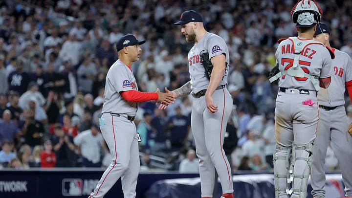 Sep 30, 2025; Bronx, New York, USA; Boston Red Sox manager Alex Cora (13) shakes hands with starting pitcher Garrett Crochet (35) during a pitching change during the eighth inning of game one of the Wildcard round of the 2025 MLB playoffs against the New York Yankees at Yankee Stadium. Mandatory Credit: Brad Penner-Imagn Images Sep 30, 2025; Bronx, New York, USA; Boston Red Sox manager Alex Cora (13) shakes hands with starting pitcher Garrett Crochet (35) during a pitching change during the eighth inning of game one of the Wildcard round of the 2025 MLB playoffs against the New York Yankees at Yankee Stadium. Mandatory Credit: Brad Penner-Imagn Images