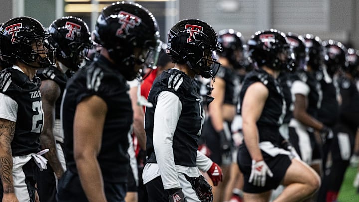 Texas Tech players go through a warm-ups during spring football practice, Wednesday, March 12, 2025, inside the Sports Performance Center.
