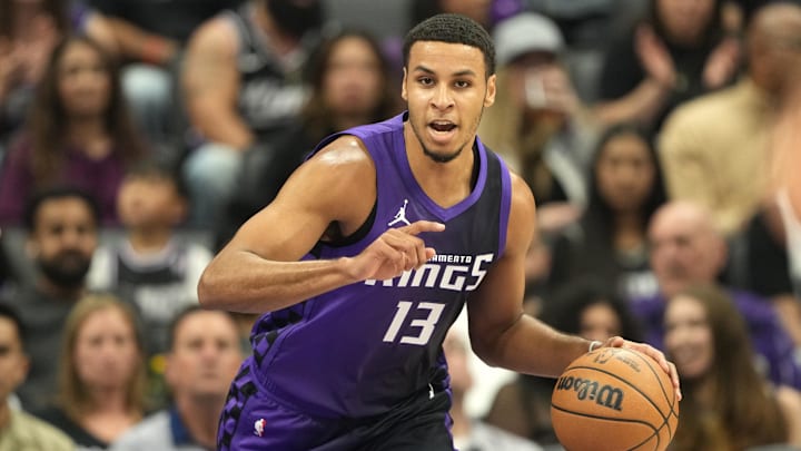 Apr 11, 2025; Sacramento, California, USA; Sacramento Kings forward Keegan Murray (13) dribbles against the Los Angeles Clippers during the first quarter at Golden 1 Center. Mandatory Credit: Darren Yamashita-Imagn Images