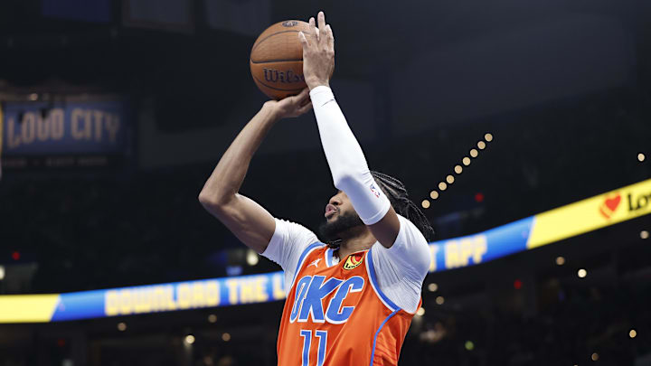 Dec 10, 2024; Oklahoma City, Oklahoma, USA; Oklahoma City Thunder guard Isaiah Joe (11) shoots a three point basket against the Dallas Mavericks during the second quarter at Paycom Center. Dec 10, 2024; Oklahoma City, Oklahoma, USA; Oklahoma City Thunder guard Isaiah Joe (11) shoots a three point basket against the Dallas Mavericks during the second quarter at Paycom Center.