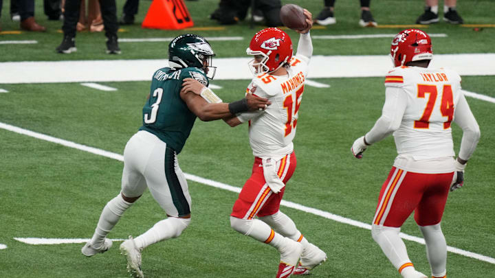Feb 9, 2025; New Orleans, LA, USA; Philadelphia Eagles linebacker Nolan Smith Jr. (3) makes a tackle on Kansas City Chiefs quarterback Patrick Mahomes (15) during the second quarter in Super Bowl LIX at Caesars Superdome. 