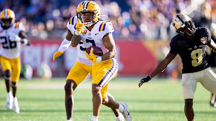 Jan 2, 2023; Orlando, FL, USA; LSU Tigers safety Greg Brooks Jr. (3) gestures after an interception during the second half against the Purdue Boilermakers at Camping World Stadium. Mandatory Credit: Matt Pendleton-Imagn Images