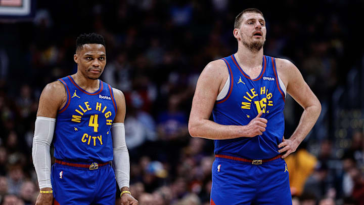 Mar 5, 2025; Denver, Colorado, USA; Denver Nuggets guard Russell Westbrook (4) and center Nikola Jokic (15) in the first quarter against the Sacramento Kings at Ball Arena. Mandatory Credit: Isaiah J. Downing-Imagn Images