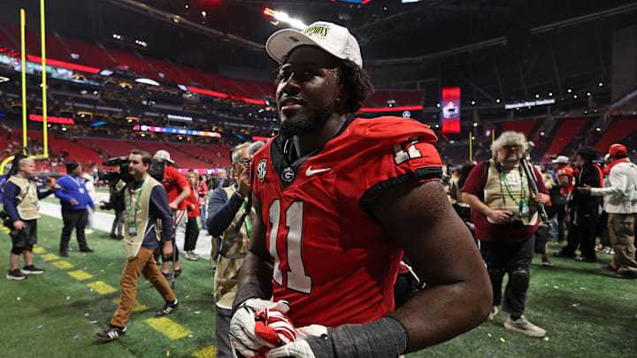 Dec 7, 2024; Atlanta, GA, USA; Georgia Bulldogs linebacker Jalon Walker (11) reacts after defeating the Texas Longhorns in overtime in the 2024 SEC Championship game at Mercedes-Benz Stadium. Mandatory Credit: Brett Davis-Imagn Images