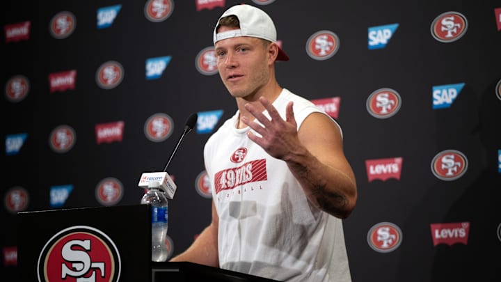 Jun 11, 2025; Santa Clara, CA, USA; San Francisco 49ers running back Christian McCaffrey speaks to the media following a team OTA at Levi's Stadium. Mandatory Credit: D. Ross Cameron-Imagn Images