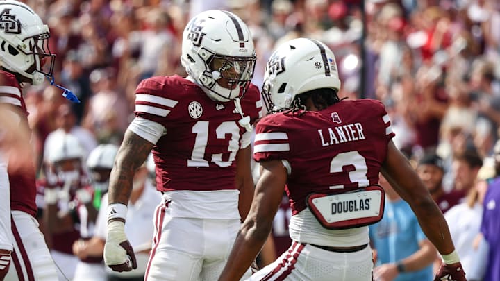 Mississippi State Bulldogs defensive back Jahron Manning (13) and defensive back Brylan Lanier (3) react against the Georgia Bulldogs against during the first half at Davis Wade Stadium at Scott Field.