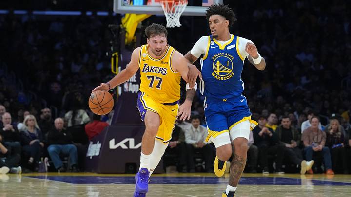 Los Angeles Lakers guard Luka Doncic drives to the basket against Golden State Warriors forward Yaxel Lendeborg. Los Angeles Lakers guard Luka Doncic drives to the basket against Golden State Warriors forward Yaxel Lendeborg.