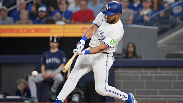 Apr 19, 2025; Toronto, Ontario, CAN;  Toronto Blue Jays right fielder Anthony Santander (25) hits an RBI single against the Seattle Mariners in the first inning at Rogers Centre.