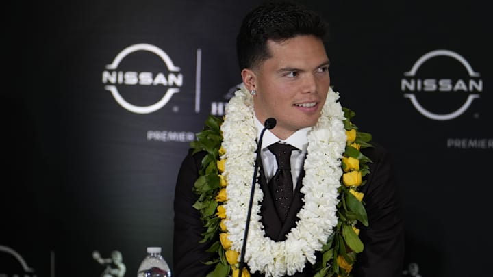 Dec 14, 2024; New York, NY, USA; Oregon Ducks quarterback Dillon Gabriel listens on stage during a press conference before the 2024 Heisman Trophy Presentation. Mandatory Credit: Lucas Boland-Imagn Images Dec 14, 2024; New York, NY, USA; Oregon Ducks quarterback Dillon Gabriel listens on stage during a press conference before the 2024 Heisman Trophy Presentation. Mandatory Credit: Lucas Boland-Imagn Images