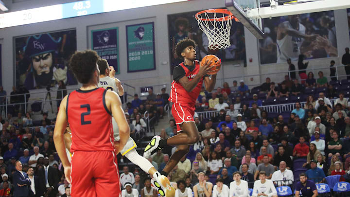 Jaxon Richardson of the Miami Columbus High School basketball team drives to the basket during the championship game against Montverde at the City of Palms Classic at Suncoast Credit Union Arena in Fort Myers on Monday, Dec. 23, 2024.