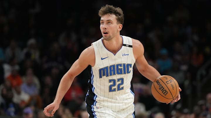 Orlando Magic forward Franz Wagner (22) dribbles the ball against the Phoenix Suns during the second half of an NBA game at Footprint Center. Orlando Magic forward Franz Wagner (22) dribbles the ball against the Phoenix Suns during the second half of an NBA game at Footprint Center.