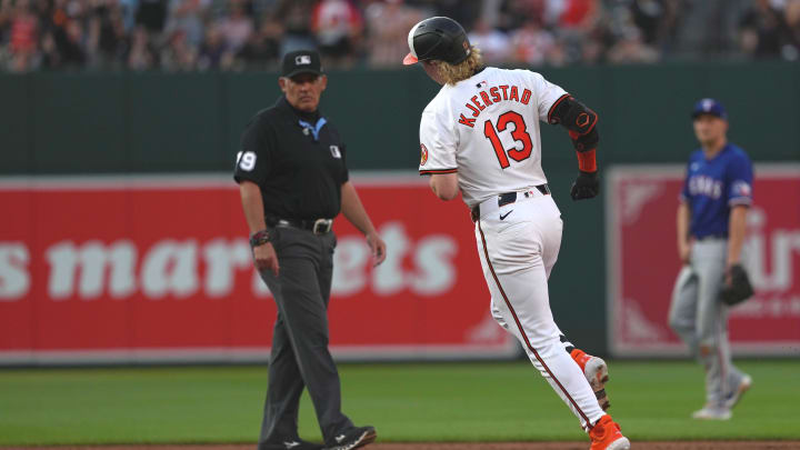 Jun 27, 2024; Baltimore, Maryland, USA; Baltimore Orioles outfielder Heston Kjerstad (13) rounds the bases following his two-run home run in the third inning against the Texas Rangers at Oriole Park at Camden Yards. 