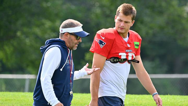 Jul 28, 2026; Foxborough, MA, USA; New England Patriots offensive coordinator Josh McDaniels and quarterback Drake Maye (10) speak as they walk to practice for training camp at Gillette Stadium. Mandatory Credit: Eric Canha-Imagn Images Jul 28, 2026; Foxborough, MA, USA; New England Patriots offensive coordinator Josh McDaniels and quarterback Drake Maye (10) speak as they walk to practice for training camp at Gillette Stadium. Mandatory Credit: Eric Canha-Imagn Images