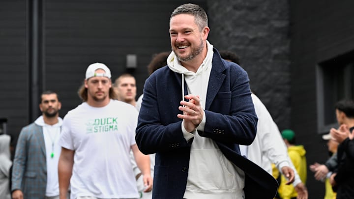 Oct 11, 2025; Eugene, Oregon, USA; Oregon Ducks head coach Dan Lanning arrives with players before the game between the Indiana Hoosiers and the Oregon Ducks at Autzen Stadium. Mandatory Credit: Troy Wayrynen-Imagn Images