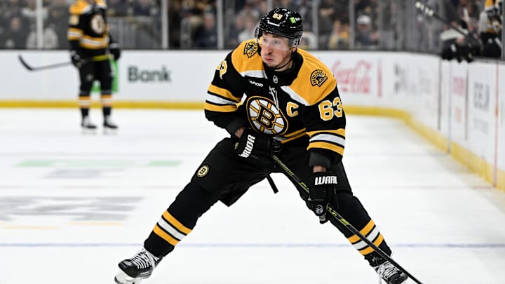 Feb 25, 2025; Boston, Massachusetts, USA; Boston Bruins left wing Brad Marchand (63) skates against the Toronto Maple Leafs during the first period at the TD Garden. Mandatory Credit: Brian Fluharty-Imagn Images
