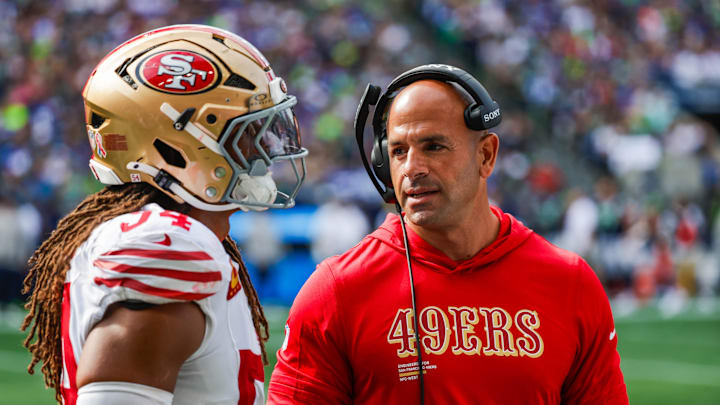 Sep 7, 2025; Seattle, Washington, USA; San Francisco 49ers defensive coordinator Robert Saleh talks with linebacker Fred Warner (54) during the fourth quarter against the Seattle Seahawks at Lumen Field. Mandatory Credit: Joe Nicholson-Imagn Images