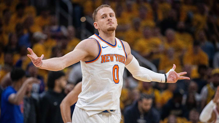 May 17, 2024; Indianapolis, Indiana, USA; New York Knicks guard Donte DiVincenzo (0) reacts after a made basket during game six of the second round for the 2024 NBA playoffs against the Indiana Pacers at Gainbridge Fieldhouse. Mandatory Credit: Trevor Ruszkowski-Imagn Images May 17, 2024; Indianapolis, Indiana, USA; New York Knicks guard Donte DiVincenzo (0) reacts after a made basket during game six of the second round for the 2024 NBA playoffs against the Indiana Pacers at Gainbridge Fieldhouse. Mandatory Credit: Trevor Ruszkowski-Imagn Images