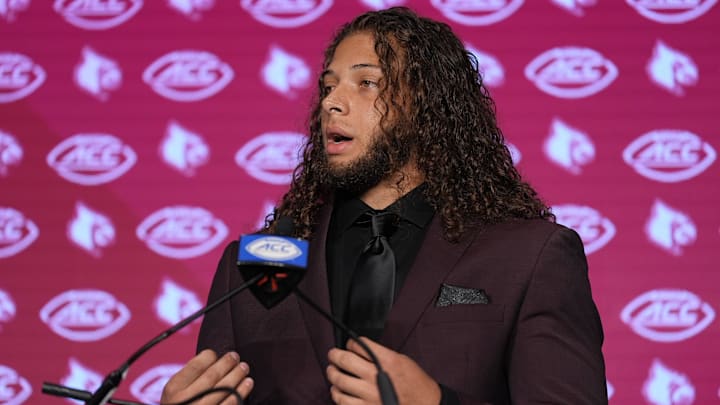 Jul 24, 2024; Charlotte, NC, USA; Louisville Cardinals defensive lineman Ashton Gillotte speaks to the media during the ACC Kickoff at Hilton Charlotte Uptown. Mandatory Credit: Jim Dedmon-Imagn Images Jul 24, 2024; Charlotte, NC, USA; Louisville Cardinals defensive lineman Ashton Gillotte speaks to the media during the ACC Kickoff at Hilton Charlotte Uptown. Mandatory Credit: Jim Dedmon-Imagn Images