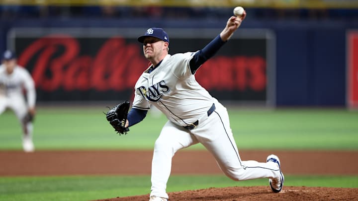 Sep 19, 2024; St. Petersburg, Florida, USA; Tampa Bay Rays pitcher Garrett Cleavinger (60) throws a pitch against the Boston Red Sox in the ninth inning at Tropicana Field.
