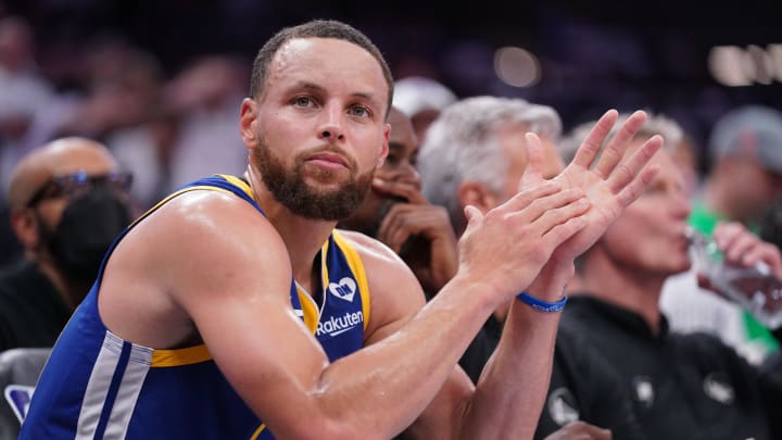 Apr 16, 2024; Sacramento, California, USA; Golden State Warriors guard Stephen Curry (30) sits on the bench during action against the Sacramento Kings in the fourth quarter during a play-in game of the 2024 NBA playoffs at the Golden 1 Center. Mandatory Credit: Cary Edmondson-USA TODAY Sports