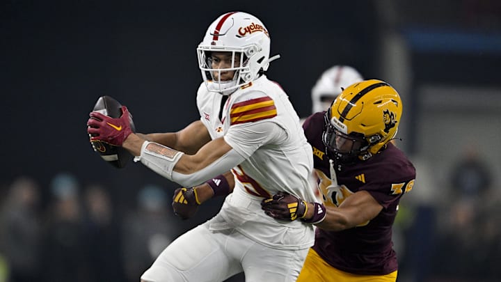 Dec 7, 2024; Arlington, TX, USA; Iowa State Cyclones wide receiver Jayden Higgins (9) and Arizona State Sun Devils defensive back Kyan McDonald (38) in action during the game between the Iowa State Cyclones and the Arizona State Sun Devils at AT&T Stadium. Mandatory Credit: Jerome Miron-Imagn Images Dec 7, 2024; Arlington, TX, USA; Iowa State Cyclones wide receiver Jayden Higgins (9) and Arizona State Sun Devils defensive back Kyan McDonald (38) in action during the game between the Iowa State Cyclones and the Arizona State Sun Devils at AT&T Stadium. Mandatory Credit: Jerome Miron-Imagn Images