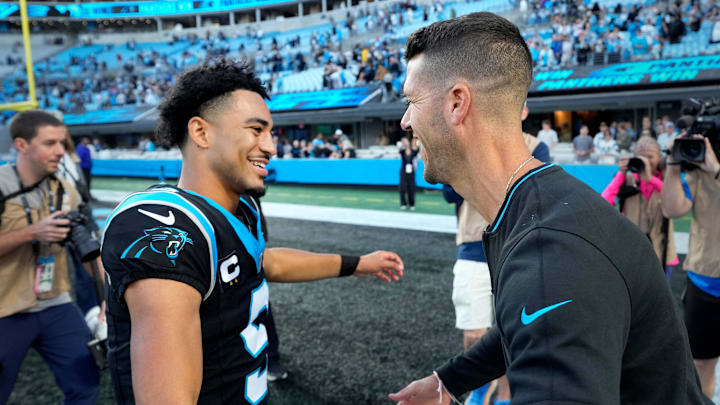 Nov 3, 2024; Charlotte, North Carolina, USA; Carolina Panthers quarterback Bryce Young (9) with head coach Dave Canales after the game at Bank of America Stadium. Mandatory Credit: Bob Donnan-Imagn Images Nov 3, 2024; Charlotte, North Carolina, USA; Carolina Panthers quarterback Bryce Young (9) with head coach Dave Canales after the game at Bank of America Stadium. Mandatory Credit: Bob Donnan-Imagn Images