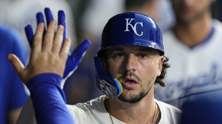 Sep 4, 2025; Kansas City, Missouri, USA; Kansas City Royals first baseman Vinnie Pasquantino (9) is congratulated by teammates after hitting a home run during the fourth inning against the Los Angeles Angels at Kauffman Stadium. Mandatory Credit: Jay Biggerstaff-Imagn Images