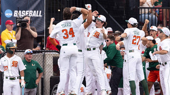 Miami celebrates after Miami infielder Daniel Cuvet’s home run during the NCAA baseball Super Regional game 2 at Jim Patterson Stadium on June 7, 2025 in Louisville, Ky. Miami celebrates after Miami infielder Daniel Cuvet’s home run during the NCAA baseball Super Regional game 2 at Jim Patterson Stadium on June 7, 2025 in Louisville, Ky.