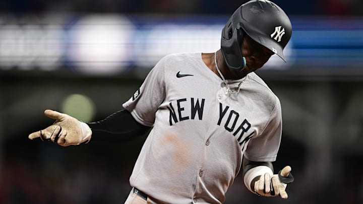 Apr 21, 2025; Cleveland, Ohio, USA; New York Yankees second baseman Jazz Chisholm Jr. (13) runs the bases after hitting a two run home run off Cleveland Guardians relief pitcher Paul Sewald (34) during the eighth inning at Progressive Field. Apr 21, 2025; Cleveland, Ohio, USA; New York Yankees second baseman Jazz Chisholm Jr. (13) runs the bases after hitting a two run home run off Cleveland Guardians relief pitcher Paul Sewald (34) during the eighth inning at Progressive Field.