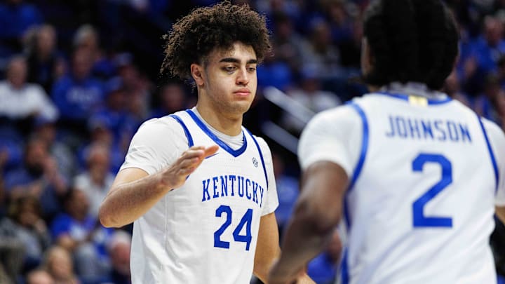 Jan 21, 2026; Lexington, Kentucky, USA; Kentucky Wildcats center Malachi Moreno (24) fives guard Jasper Johnson (2) during the second half against the Texas Longhorns at Rupp Arena at Central Bank Center. Mandatory Credit: Jordan Prather-Imagn Images