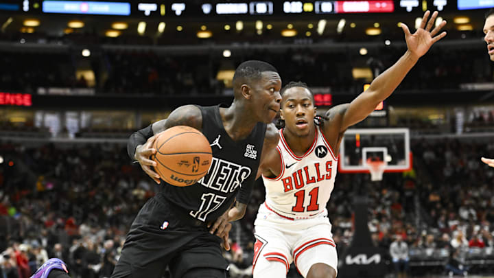 Dec 2, 2024; Chicago, Illinois, USA; Brooklyn Nets guard Dennis Schroder (17) drives to the basket against Chicago Bulls guard Ayo Dosunmu (11) during the second half at the United Center. Mandatory Credit: Matt Marton-Imagn Images Dec 2, 2024; Chicago, Illinois, USA; Brooklyn Nets guard Dennis Schroder (17) drives to the basket against Chicago Bulls guard Ayo Dosunmu (11) during the second half at the United Center. Mandatory Credit: Matt Marton-Imagn Images