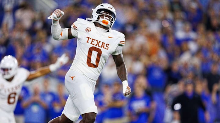 Oct 18, 2025; Lexington, Kentucky, USA; Texas Longhorns linebacker Anthony Hill Jr. (0) celebrates after the Kentucky Wildcats fail to score in overtime at Kroger Field.
