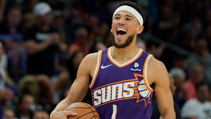 Apr 7, 2024; Phoenix, Arizona, USA;  Phoenix Suns guard Devin Booker (1) reacts after stealing the ball against the New Orleans Pelicans in the second half at Footprint Center. Mandatory Credit: Allan Henry-Imagn Images