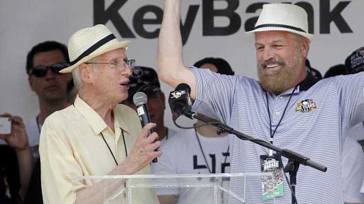 Jun 14, 2017; Pittsburgh, PA, USA;  Pittsburgh Penguins broadcasters Mike Lange (left) and Phil Bourque (right) during the Stanley Cup championship parade and rally in downtown Pittsburgh. Mandatory Credit: Charles LeClaire-Imagn Images