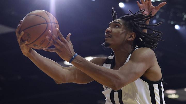 Feb 18, 2024; Indianapolis, Indiana, USA; Team Giraffe Stars forward Ron Holland (0) of the G League Ignite leaps for the net against Team BallIsLife during the G-League Next Up game at Indiana Convention Center. Mandatory Credit: Trevor Ruszkowski-USA TODAY Sports Feb 18, 2024; Indianapolis, Indiana, USA; Team Giraffe Stars forward Ron Holland (0) of the G League Ignite leaps for the net against Team BallIsLife during the G-League Next Up game at Indiana Convention Center. Mandatory Credit: Trevor Ruszkowski-USA TODAY Sports