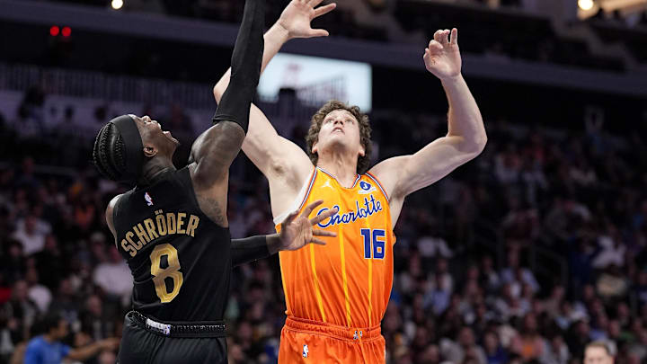 Feb 20, 2026; Charlotte, North Carolina, USA; Charlotte Hornets center PJ Hall (16) defends Cleveland Cavaliers guard Dennis Schroder (8) during the second half at the Spectrum Center. Mandatory Credit: Jim Dedmon-Imagn Images Feb 20, 2026; Charlotte, North Carolina, USA; Charlotte Hornets center PJ Hall (16) defends Cleveland Cavaliers guard Dennis Schroder (8) during the second half at the Spectrum Center. Mandatory Credit: Jim Dedmon-Imagn Images