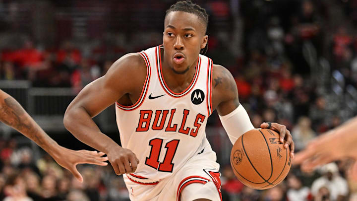 Jan 18, 2026; Chicago, Illinois, USA; Chicago Bulls guard Ayo Dosunmu (11) drives against the Brooklyn Nets during the first half at United Center. Mandatory Credit: Patrick Gorski-Imagn Images