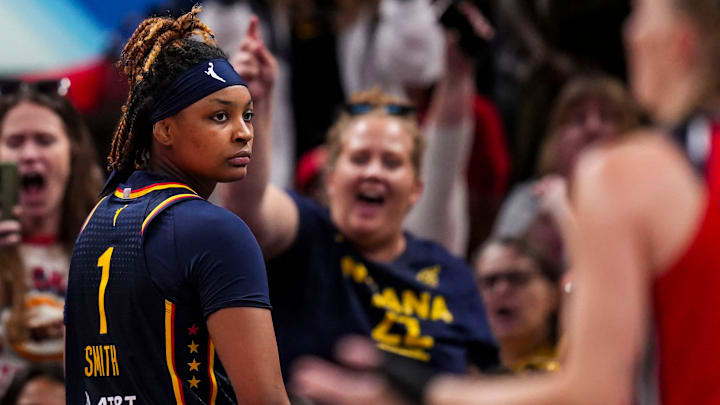 Indiana Fever forward NaLyssa Smith (1) celebrates scoring Wednesday, July 10, 2024, during the game at Gainbridge Fieldhouse in Indianapolis.