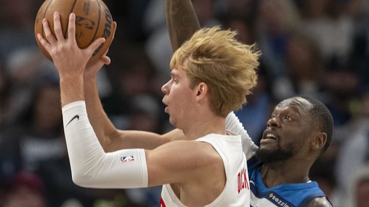 Oct 26, 2024; Minneapolis, Minnesota, USA; Toronto Raptors guard Gradey Dick (1) drives to the basket past Minnesota Timberwolves forward Julius Randle (30) in the first half at Target Center. Mandatory Credit: Jesse Johnson-Imagn Images Oct 26, 2024; Minneapolis, Minnesota, USA; Toronto Raptors guard Gradey Dick (1) drives to the basket past Minnesota Timberwolves forward Julius Randle (30) in the first half at Target Center. Mandatory Credit: Jesse Johnson-Imagn Images