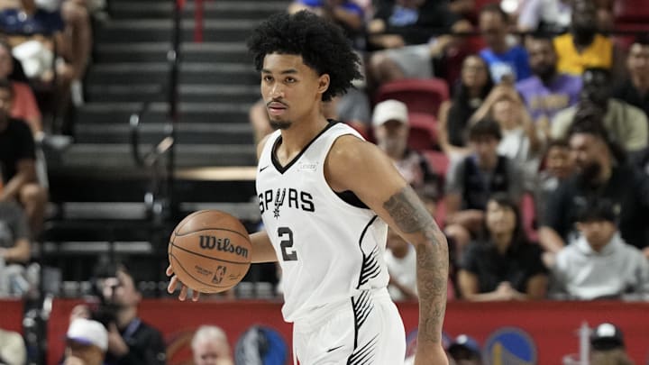 Jul 12, 2025; Las Vegas, NV, USA; San Antonio Spurs guard Dylan Harper (2) dribbles the ball against the Dallas Mavericks in the first quarter of their game at Thomas & Mack Center. Jul 12, 2025; Las Vegas, NV, USA; San Antonio Spurs guard Dylan Harper (2) dribbles the ball against the Dallas Mavericks in the first quarter of their game at Thomas & Mack Center.