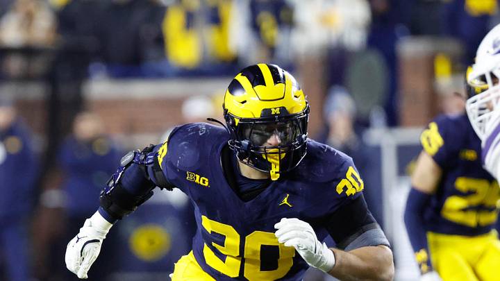 Nov 23, 2024; Ann Arbor, Michigan, USA;  Michigan Wolverines linebacker Jimmy Rolder (30) pursues a play on defense against the Northwestern Wildcats at Michigan Stadium. Mandatory Credit: Rick Osentoski-Imagn Images