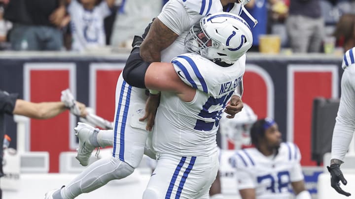 Oct 27, 2024; Houston, Texas, USA; Indianapolis Colts quarterback Anthony Richardson (5) celebrates with guard Quenton Nelson (56) after throwing a touchdown pass during the first quarter against the Houston Texans at NRG Stadium. Mandatory Credit: Troy Taormina-Imagn Images