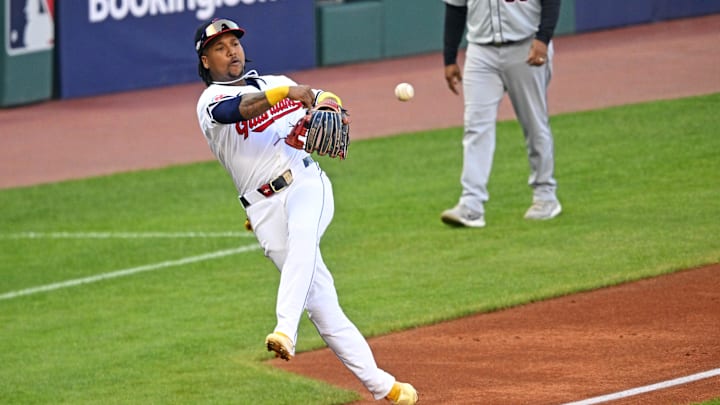 Oct 7, 2024; Cleveland, Ohio, USA; Cleveland Guardians third base Jose Ramirez (11) throws a ball to first base during the second inning against the Detroit Tigers during game two of the ALDS for the 2024 MLB Playoffs at Progressive Field. Mandatory Credit: David Richard-Imagn Images