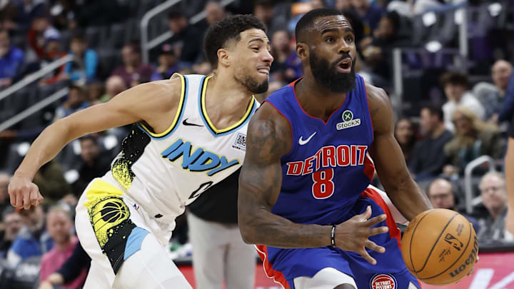 Jan 16, 2025; Detroit, Michigan, USA;  Detroit Pistons forward Tim Hardaway Jr. (8) dribbles on Indiana Pacers guard Tyrese Haliburton (0) in the first half at Little Caesars Arena. Mandatory Credit: Rick Osentoski-Imagn Images