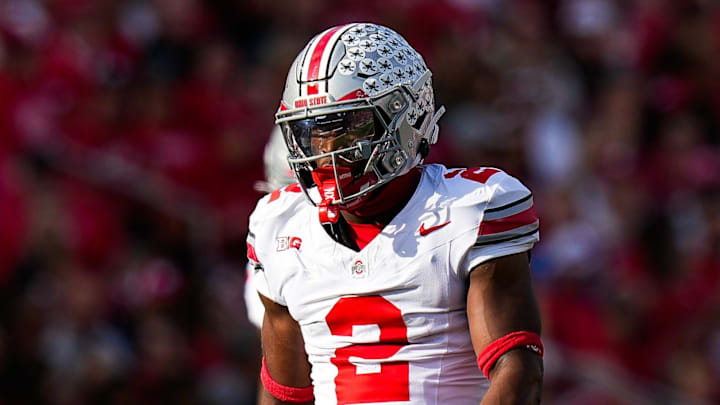 Ohio State Buckeyes defensive back Caleb Downs reacts during the game against the Wisconsin Badgers at Camp Randall Stadium.
