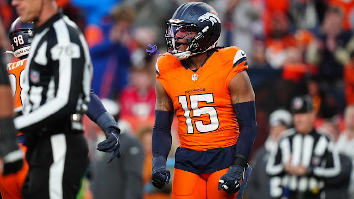 Nov 17, 2024; Denver, Colorado, USA; Denver Broncos linebacker Nik Bonitto (15) celebrates his sack in the second half against the Atlanta Falcons at Empower Field at Mile High. 